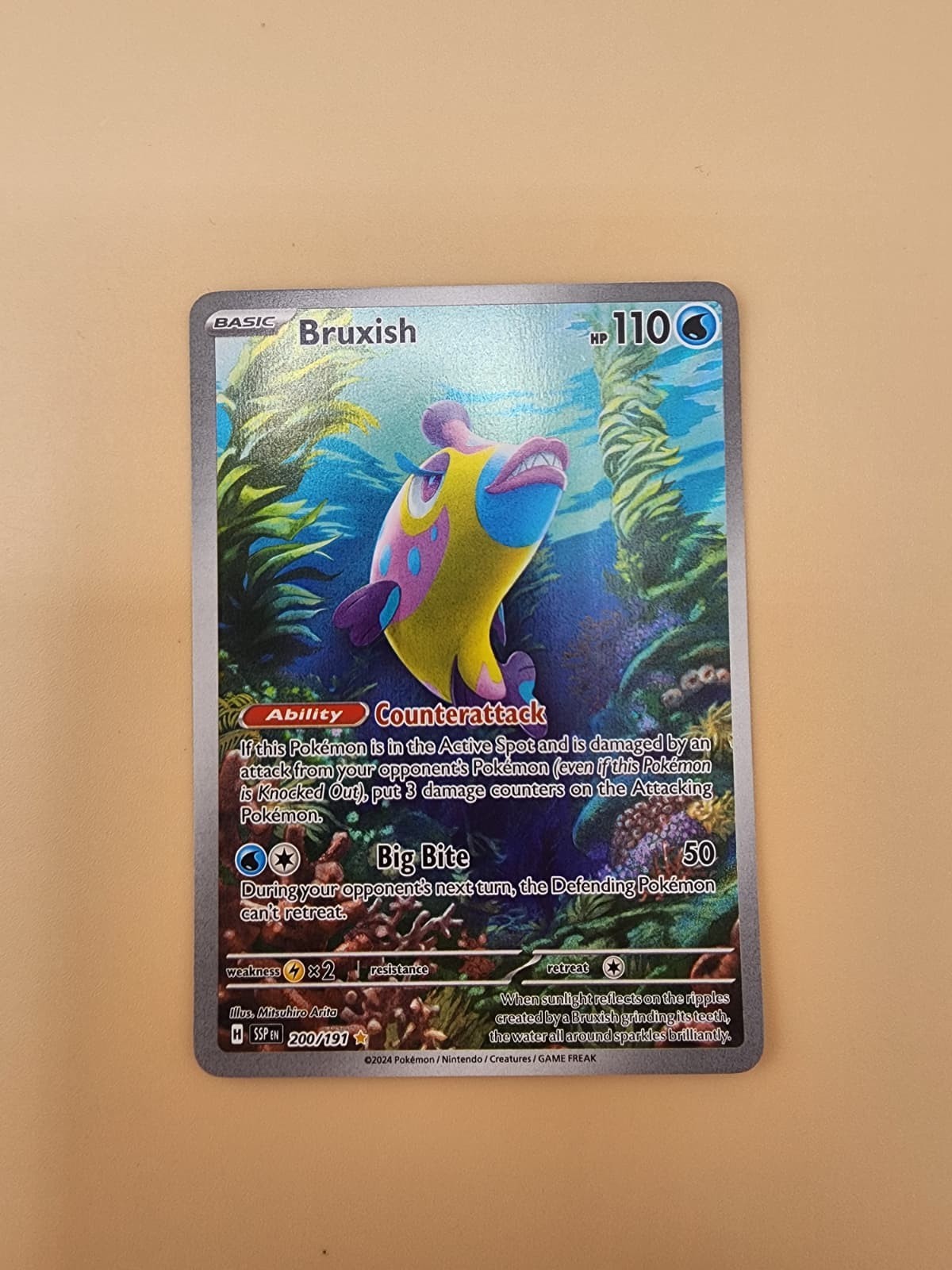 Bruxish 200/191 Sv08: Surging Sparks Holo Near Mint (NM)