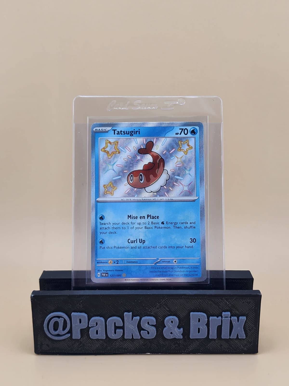 Tatsugiri 127/091 SV: Paldean Fates Holo Near Mint (NM)