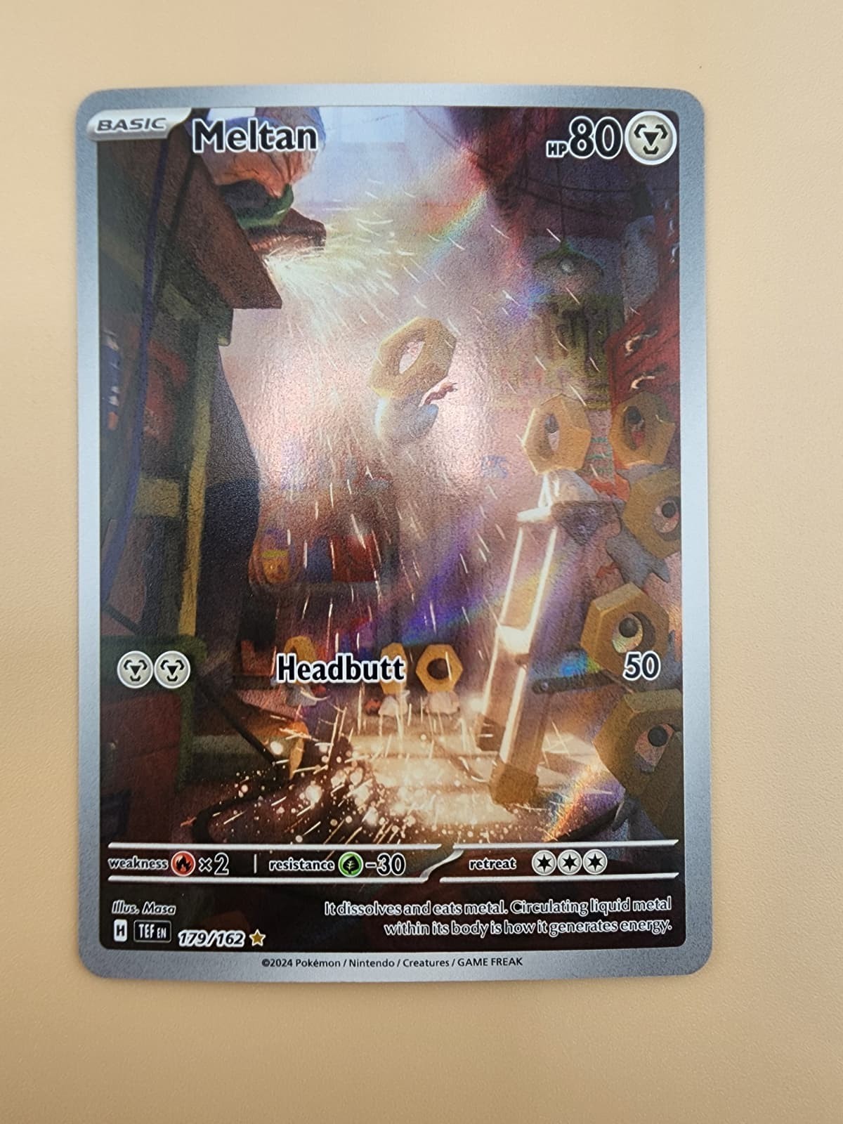 Meltan 179/162 SV05: Temporal Forces Holo Near Mint (NM)