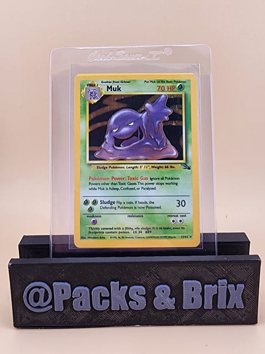 Muk 13/62 Fossil Holo Lightly Played (LP)
