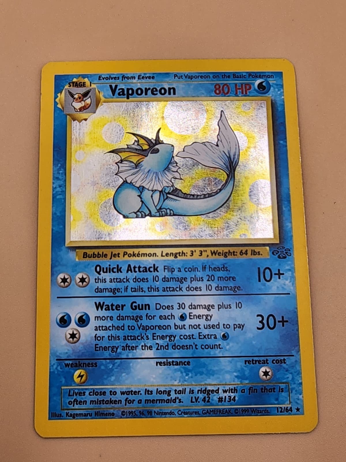Vaporeon 12/64 Jungle Holo Heavily Played (HP)