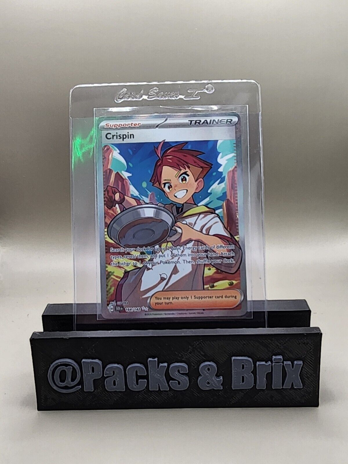 Crispin - 164/142 SV07: Stellar Crown Pokemon Ultra Rare Holofoil   NM