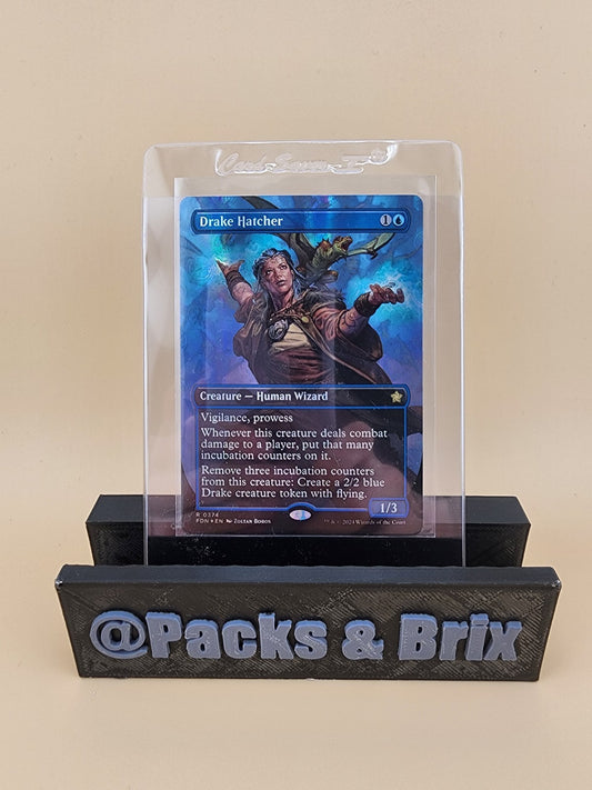 Drake Hatcher (Borderless) (Mana Foil) Foundations Foil NM