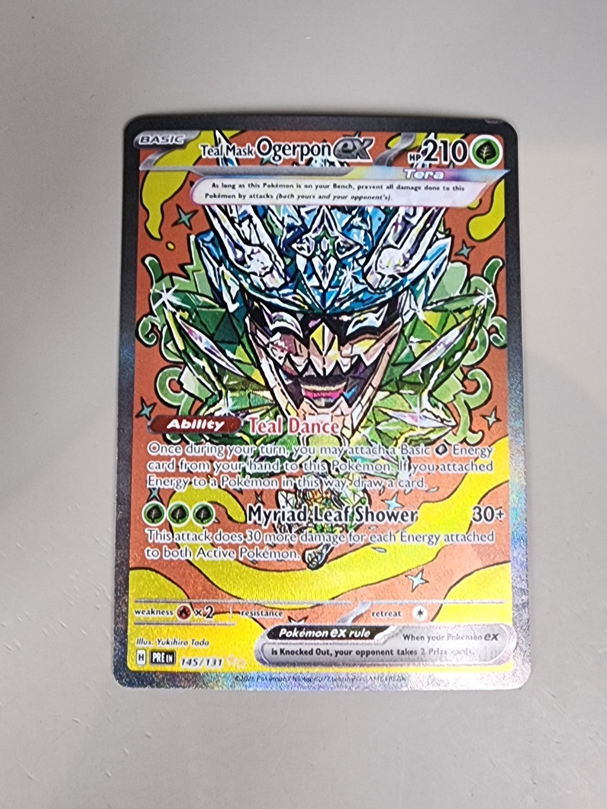 Teal Mask Ogerpon ex 145/131 Sv: Prismatic Evolutions Holo NM