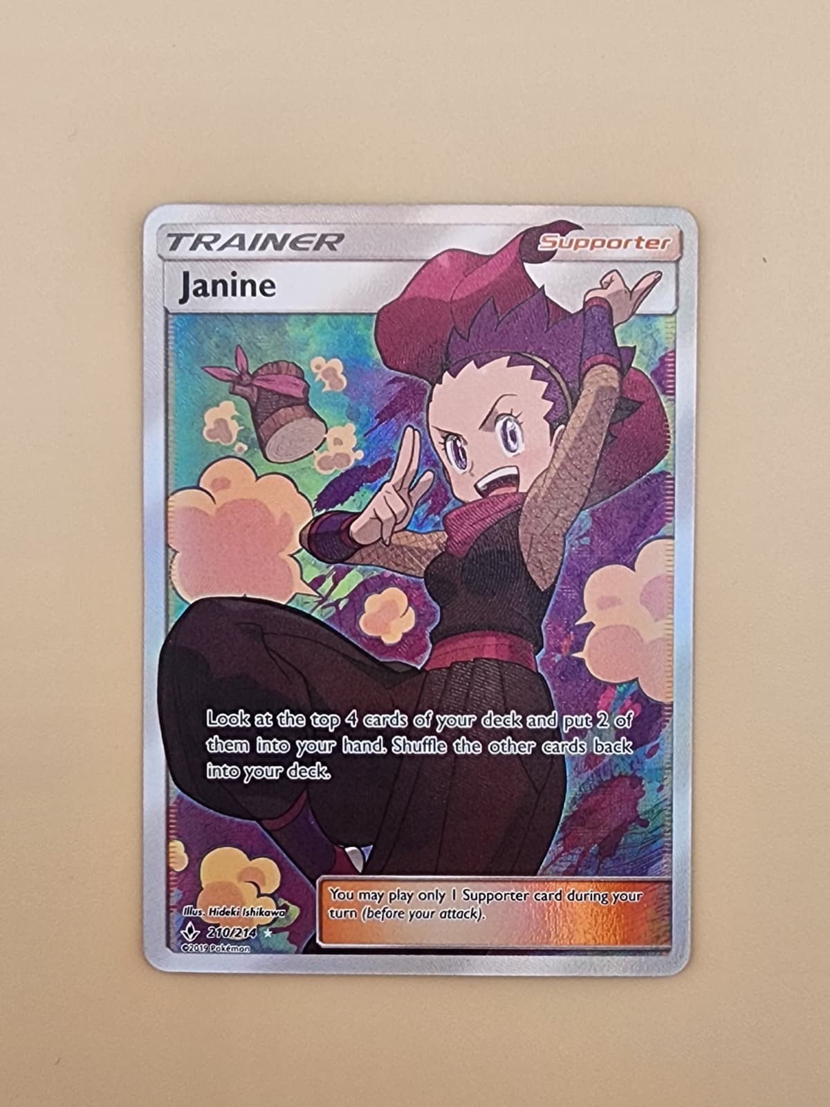 Janine (Full Art) 210/214 Sm-Unbroken Bonds Holo Near Mint NM