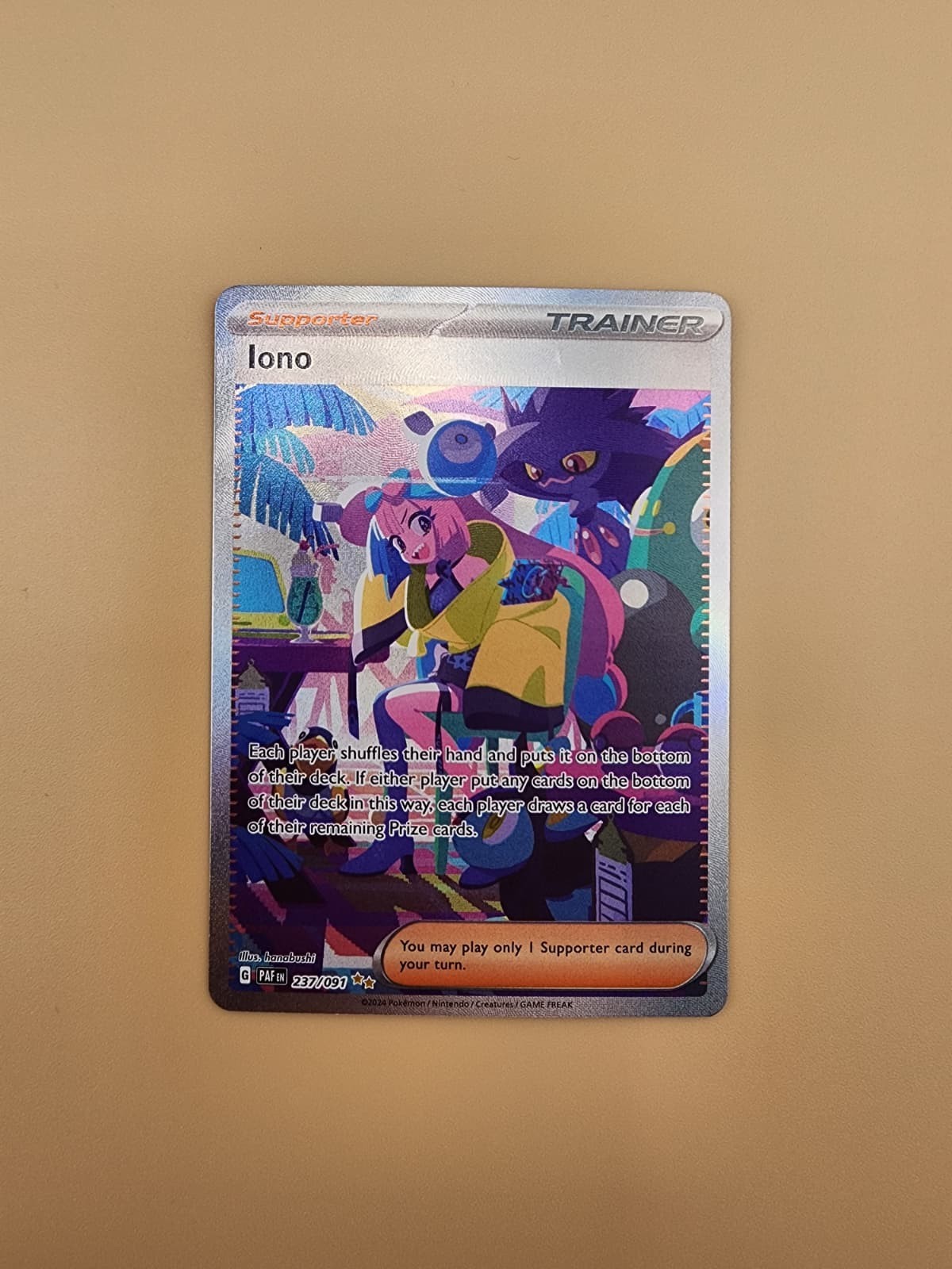 Iono 237/091 SV: Paldean Fates Holo Near Mint (NM)