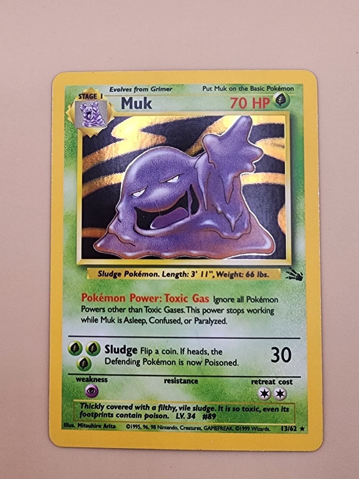 Muk 13/62 Fossil Holo Lightly Played (LP)