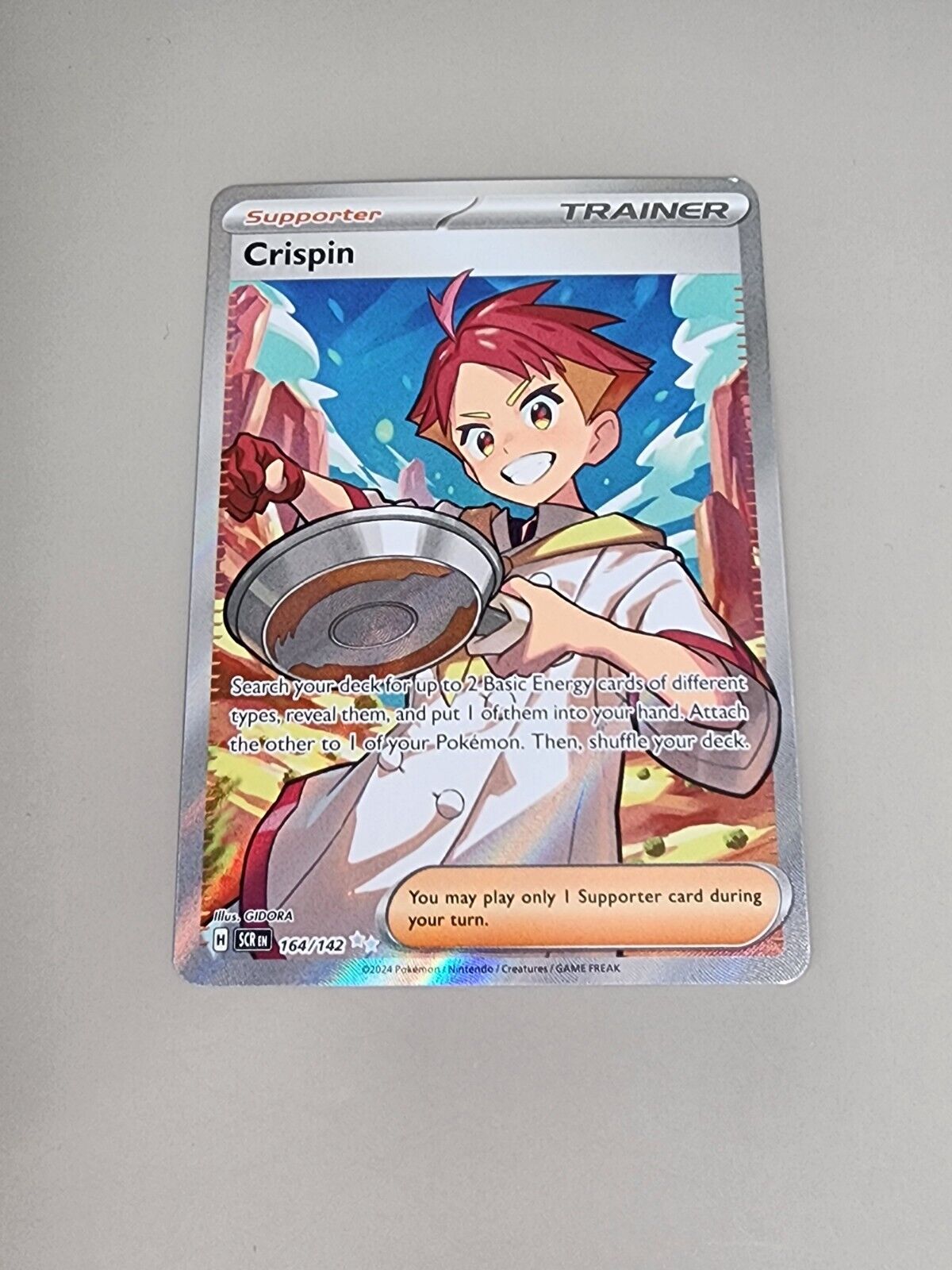 Crispin - 164/142 SV07: Stellar Crown Pokemon Ultra Rare Holofoil   NM