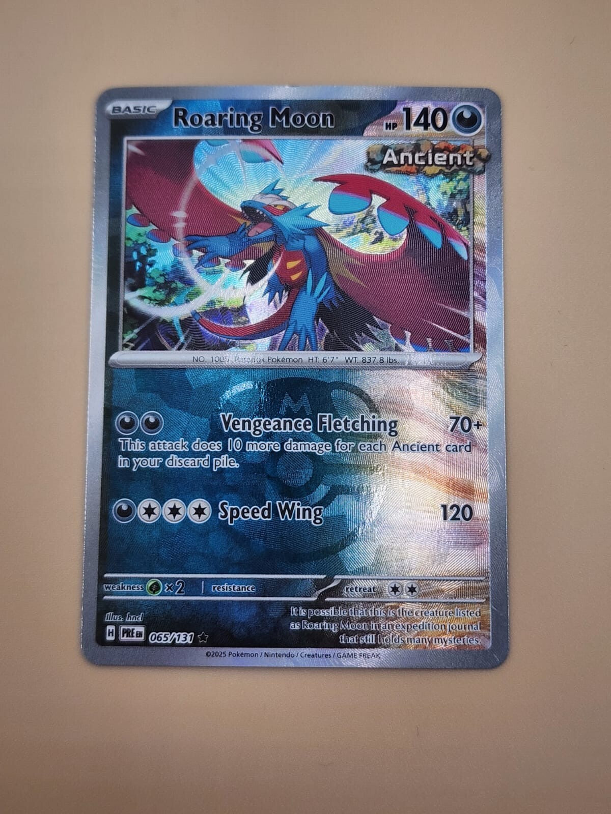 Roaring Moon (Master Ball Pattern) 065/131 Prismatic Evolutions Holo LP