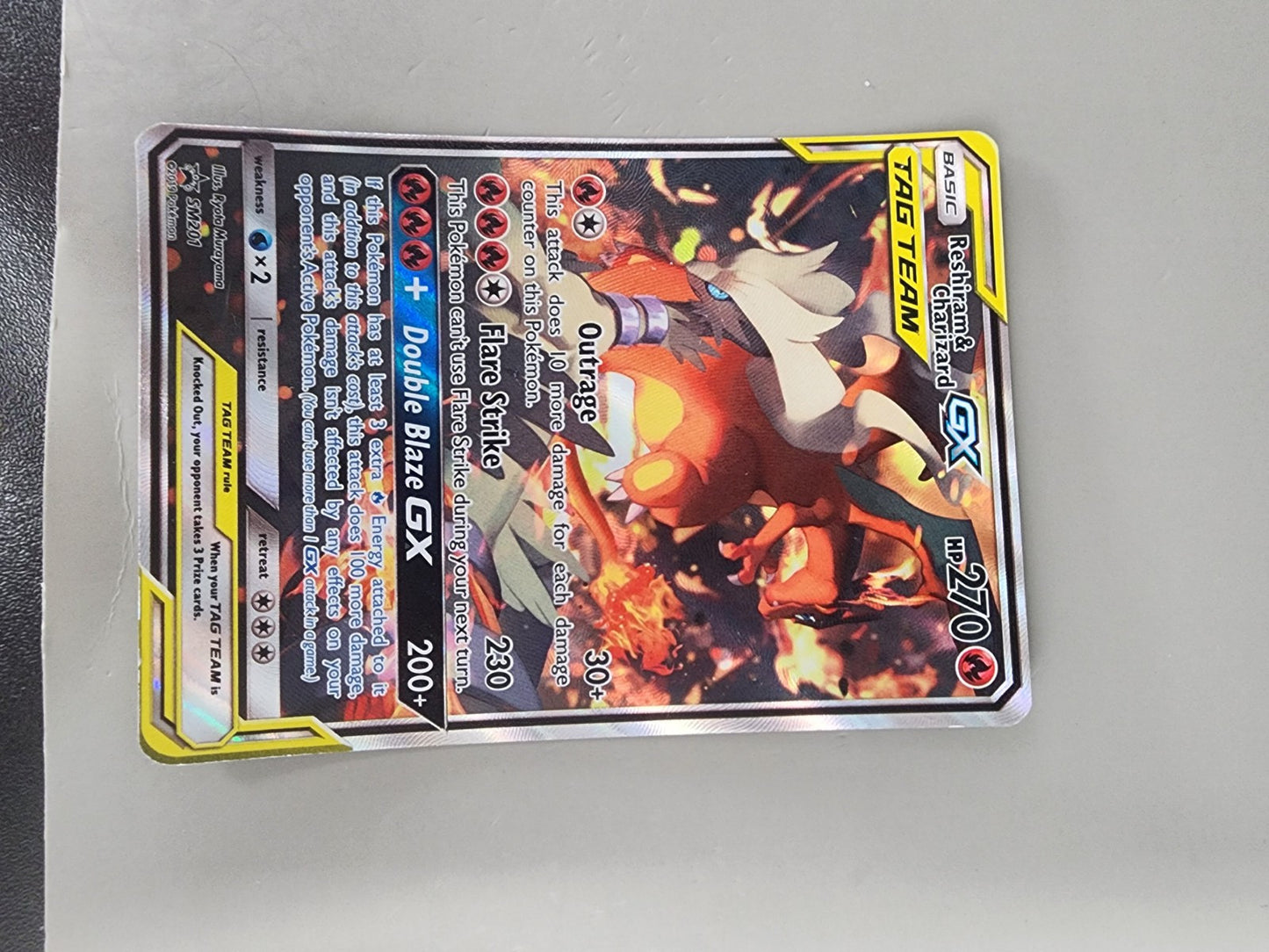 Reshiram & Charizard GX SM201 MP